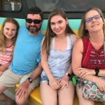 Family bonding on a Destin dolphin sightseeing cruise
