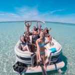 Group takes selfie aboard a Destin boat rental