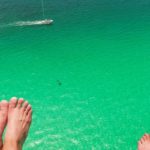 Parasailing over clear waters in Destin