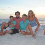 family photo shoot on the beach during sunset in Destin